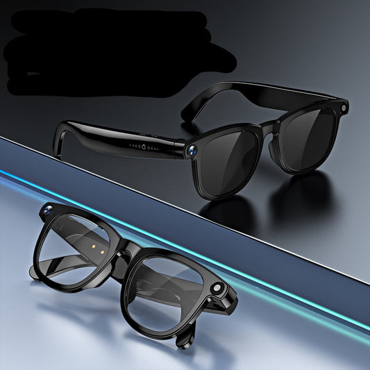 Black smart glasses with blue text on a reflective surface